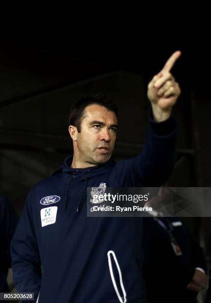 Chris Scott, coach of Geelong, looks on during the round 15 AFL match between the Greater Western Sydney Giants and the Geelong Cats at Spotless...