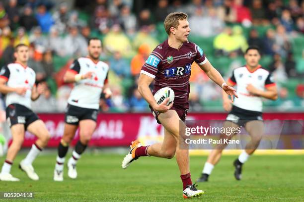 Tom Trbojevic of the Sea Eagles runs the ball during the round 17 NRL match between the Manly Sea Eagles and the New Zealand Warriors at nib Stadium...