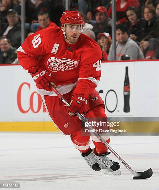 Henrik Zetterberg of the Detroit Red Wings skates with the puck during a game against the Nashville Predators on March 30, 2008 at Joe Louis Arena in...