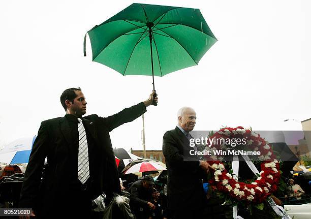 Republican presidential candidate Sen. John McCain places a wreath at the Lorraine Hotel, the site where Martin Luther King Jr. Was killed, during an...