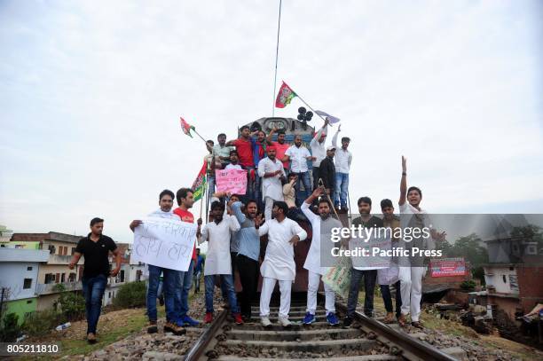Samajwadi party workers stop Ganga Gomati express during a protest against GST in Allahabad.
