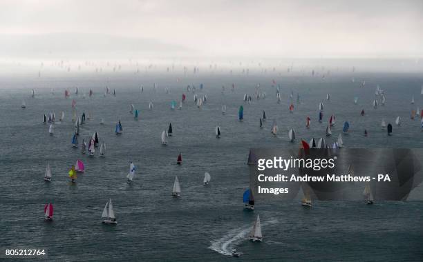 Hundreds of sailing boats make their way around the Isle of Wight close to the Needles as they take part in the 2017 Round the Island Race.