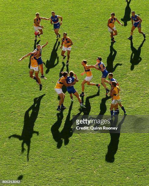 Tom Barrass of the Eagles and Jack Redpath of the Bulldogs compete for a mark during the round 15 AFL match between the Western Bulldogs and the West...