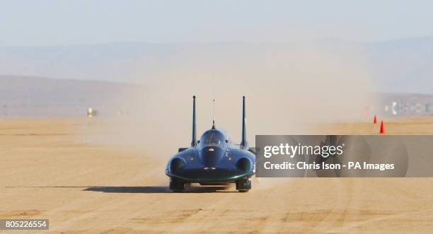 Charles Burnett III drives The British Steam Car at Rogers Dry Lake on Edwards Air Force Base, Mojave Desert, California, USA to break the land speed...