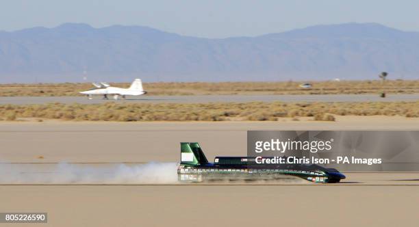 Charles Burnett III drives The British Steam Car at Rogers Dry Lake on Edwards Air Force Base, Mojave Desert, California, USA to break the land speed...