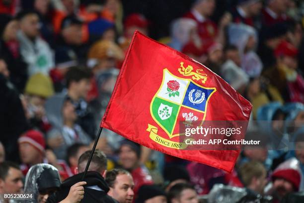 British and Irish Lions' fans celebrate during the second rugby union Test between the British and Irish Lions and the New Zealand All Blacks in...
