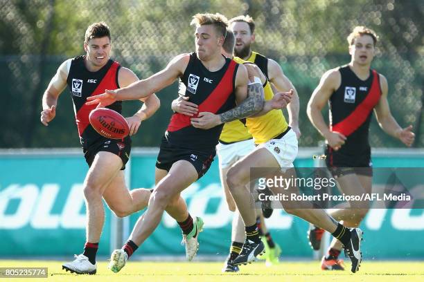 Joshua Begley of Essendon Bombers kicks the ball during the round 11 VFL match between the Essendon Bombers and the Richmond Tigers at Windy Hill on...