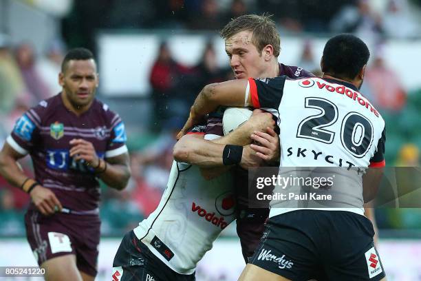 Jake Trbojevic of the Sea Eagles attempts to break thru a tackle during the round 17 NRL match between the Manly Sea Eagles and the New Zealand...