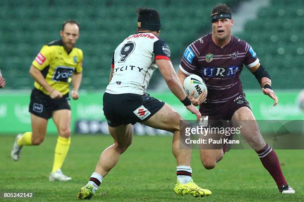 Darcy Lussick of the Sea Eagles runs the ball during the round 17 NRL match between the Manly Sea Eagles and the New Zealand Warriors at nib Stadium...