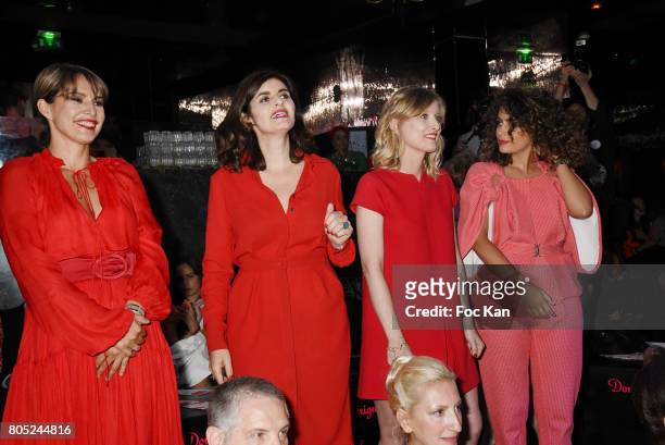 Stephanie de Muru, Sandrine Sarroche, Karine De Menonville and Anne Valerie Payet attend the 'Red Defile' Auction Fashion Show Hosted by Ajila...