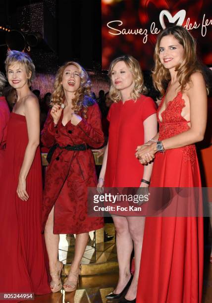 Caroline Bresard, Cyrielle Hariel, Karine De Menonville and Margaux De Frouville attend the 'Red Defile' Auction Fashion Show Hosted by Ajila...