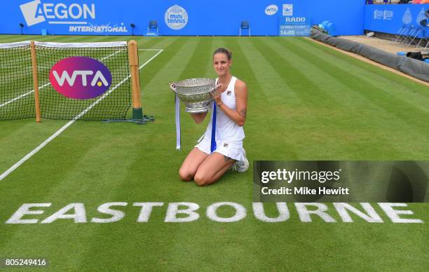 Champion Karolina Pliskova of the Czech Republic poses with the trophy following victory during the ladies singles final against Caroline Wozniacki...