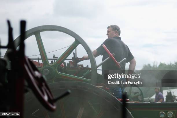 The owner of a steam engine prepares his engine for driving during the Duncombe Park Steam Rally on July 1, 2017 in Helmsley, United Kingdom. Held...