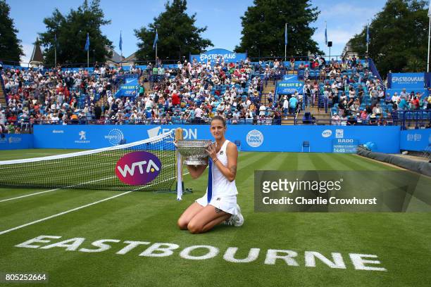 Karolina Pliskova of Czech Republic poses for photos with the cup after in winning her women's singles finals match against Caroline Wozniacki of...