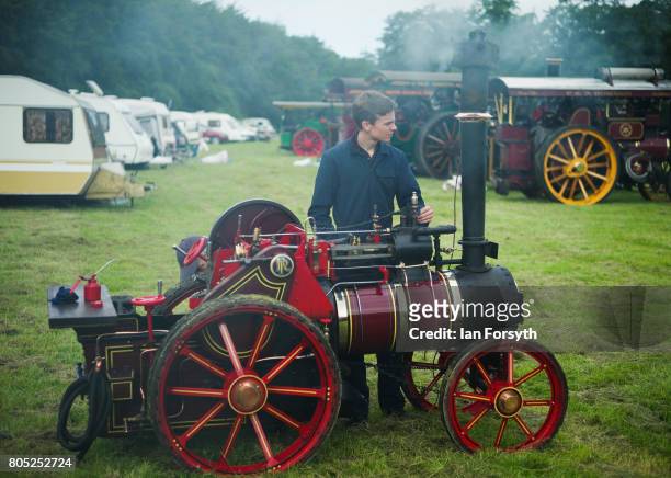 Youngster prepares his miniature steam engine during the Duncombe Park Steam Rally on July 1, 2017 in Helmsley, United Kingdom. Held annually in the...