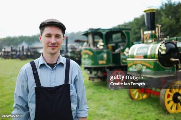 Sam Billmore from Doncaster poses for a pictureas he prepares a steam engine during the Duncombe Park Steam Rally on July 1, 2017 in Helmsley, United...