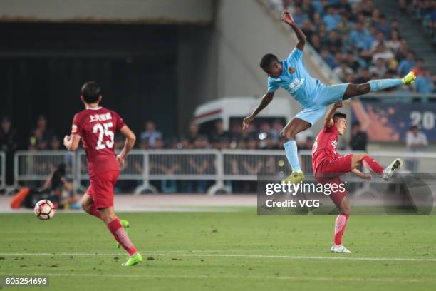 Ramires of Jiangsu Suning heads the ball during 2017 Chinese Super League 15th round match between Jiangsu Suning and Shanghai SIPG at Nanjing...