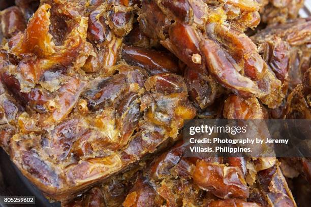 candied dates, chandni chowk, old delhi, india - chandni chowk stockfoto's en -beelden