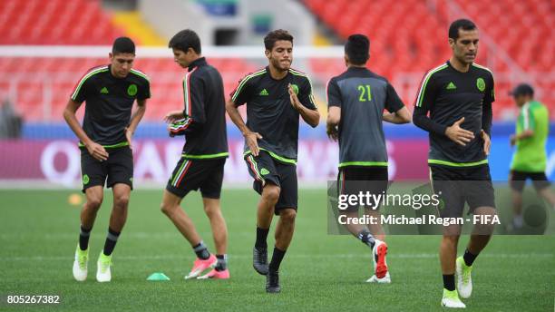 Jonathan Dos Santos warms up during the Mexico training session on July 1, 2017 in Moscow, Russia.