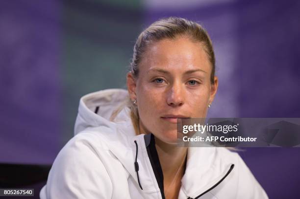 Germany's Angelique Kerber addresses a press conference in the Main Interview Room at Wimbledon on July 1 ahead of the Championship 2017 starting on...