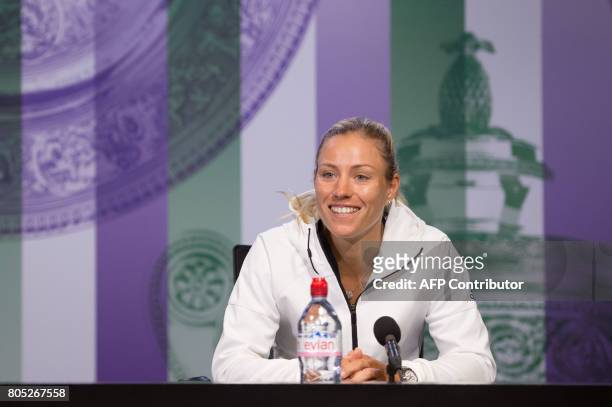 Germany's Angelique Kerber addresses a press conference in the Main Interview Room at Wimbledon on July 1 ahead of the Championship 2017 starting on...