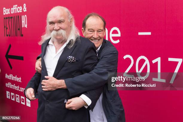 Writer Peter McDougall and actor David Hayman attend a photocall for the projection of 'A Sense of Freedom' during the 71st Edinburgh International...