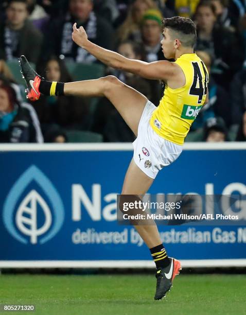 Tyson Stengle of the Tigers kicks his first league goal during the 2017 AFL round 15 match between the Port Adelaide Power and the Richmond Tigers at...