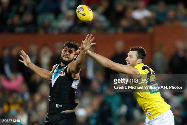Paddy Ryder of the Power and Toby Nankervis of the Tigers compete in a ruck contest during the 2017 AFL round 15 match between the Port Adelaide...