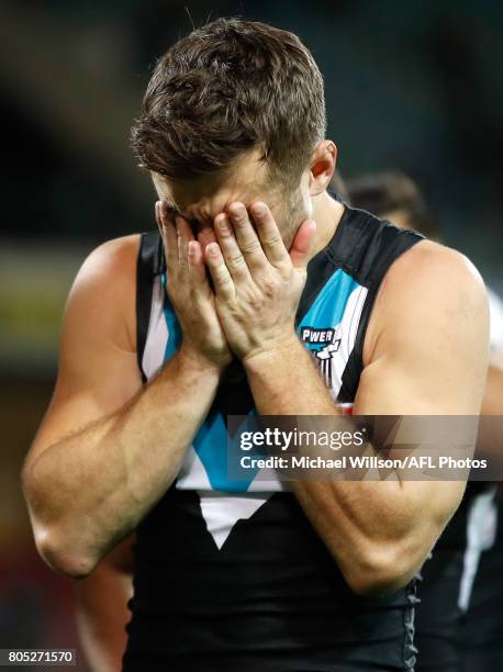 Sam Gray of the Power looks dejected after a loss during the 2017 AFL round 15 match between the Port Adelaide Power and the Richmond Tigers at...