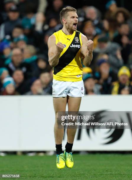 Dan Butler of the Tigers celebrates during the 2017 AFL round 15 match between the Port Adelaide Power and the Richmond Tigers at Adelaide Oval on...