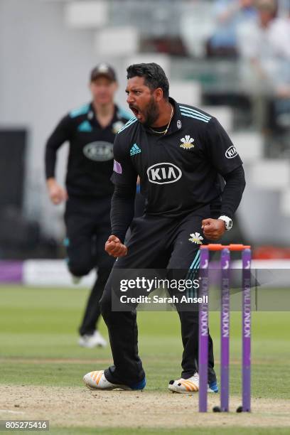 Ravi Rampaul of Surrey celebrates after taking the wicket of Nottinghamshire's Riki Wessels during the match between Nottinghamshire and Surrey at...