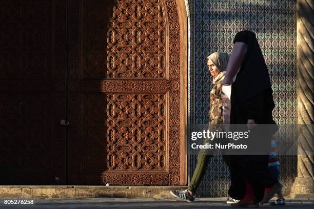 View of a woman wearing a burka walking inside Fes medina. On Saturday, July 1 in Fes, Morocco.