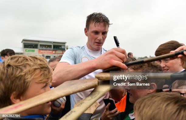 Offaly , Ireland - 1 July 2017; Austin Gleeson of Waterford signs hurleys for young fans following the GAA Hurling All-Ireland Senior Championship...