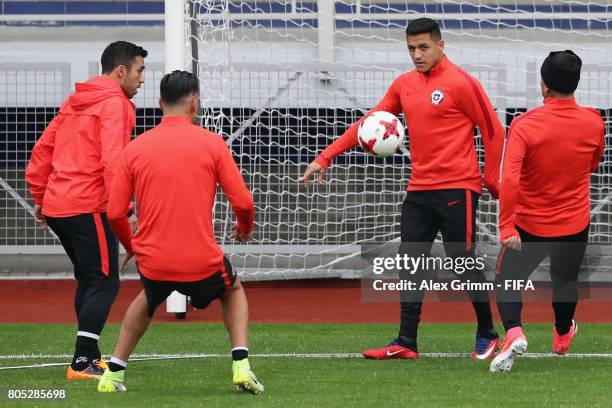 Alexis Sanchez controles the ball during a Chile training session ahead of their FIFA Confederations Cup Russia 2017 final against Germany at Smena...