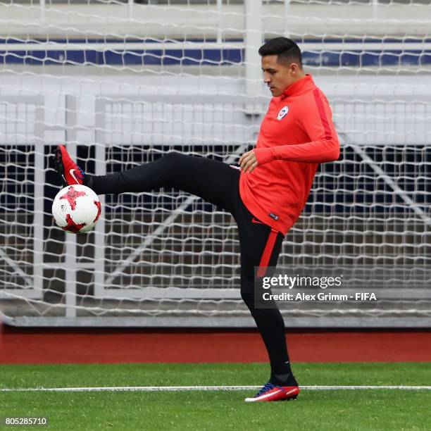 Alexis Sanchez controles the ball during a Chile training session ahead of their FIFA Confederations Cup Russia 2017 final against Germany at Smena...