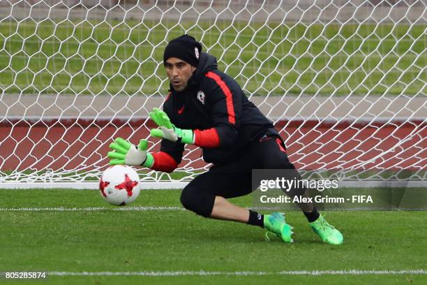 Goalkeeper Claudio Bravo makes a save during a Chile training session ahead of their FIFA Confederations Cup Russia 2017 final against Germany at...