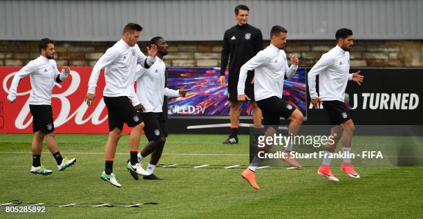 The players of Germany warm up during a training session of the German national football team on July 1, 2017 in Saint Petersburg, Russia.