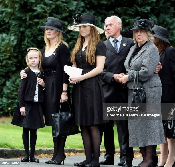 Brenda Hale at the funeral of her husband Captain Mark Hale in Hillsborough Co Down, with her two daughters Alex and Tori .