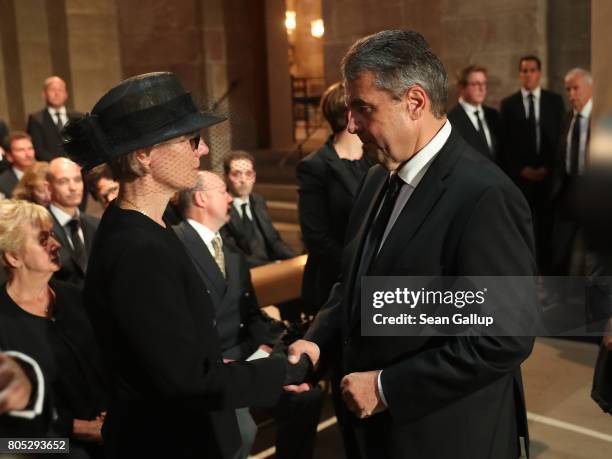 Maike Kohl-Richter , the widow of former German Chancellor Helmut Kohl, and Foreign Minister Sigmar Gabriel speak with one another at a requiem for...