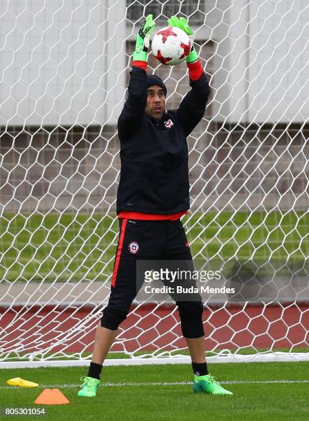 Goalkeeper Claudio Bravo makes a save during a Chile training session ahead of their FIFA Confederations Cup Russia 2017 final against Germany at...