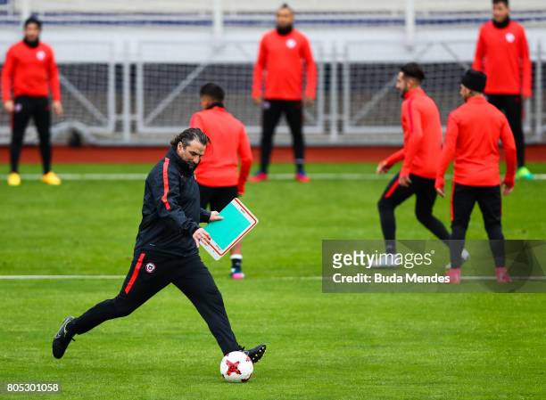 Head coach Juan Antonio Pizzi kicks the ball during a Chile training session ahead of their FIFA Confederations Cup Russia 2017 final against Germany...