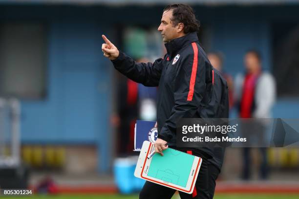 Head coach Juan Antonio Pizzi gestures during a Chile training session ahead of their FIFA Confederations Cup Russia 2017 final against Germany at...
