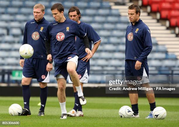 Scotland's Gary Caldwell with team mates during the training session at Hampden Park, Glasgow.