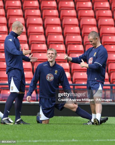 Scotland's Alan Hutton, Darren Fletcher and Kenny Miller during the training session at Hampden Park, Glasgow.