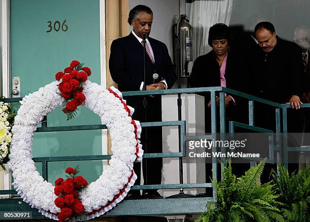 Martin Luther King III and his sister Bernice observe a moment of silence with the Rev. Al Sharpton at 6:01pm, the moment when Martin Luther King Jr....
