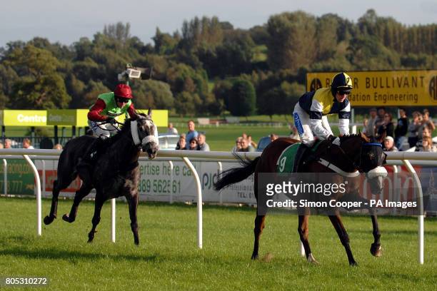 Peters Star ridden by Paul Benson wins the Jo Evans Handicap Hurdle ahead of Iris's Flyer ridden by Aidan Coleman at Uttoxeter Racecourse, Uttoxeter.