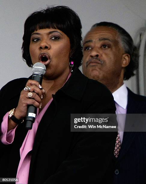 Martin Luther King Jr.'s daughter, Bernice, speaks while the Rev. Al Sharpton looks on during a vigil at the Lorraine Hotel, the site where King Jr....