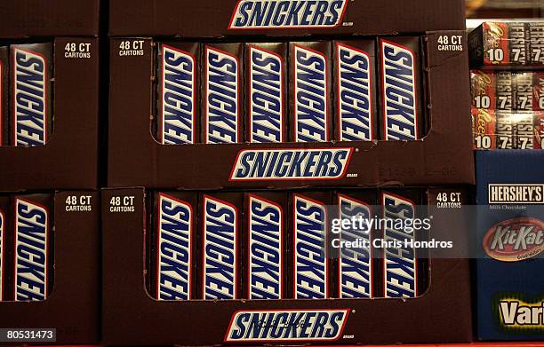 Box of large Snickers candy bars is on display at a Costco store April 4, 2008 in Tucson, Arizona. As the American economy slows down, consumers are...