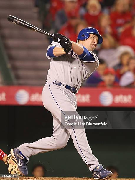 Ben Broussard of the Texas Rangers hits a grand slam homerun in the 4th inning against the Los Angeles Angels of Anaheim at Angels Stadium April 4,...