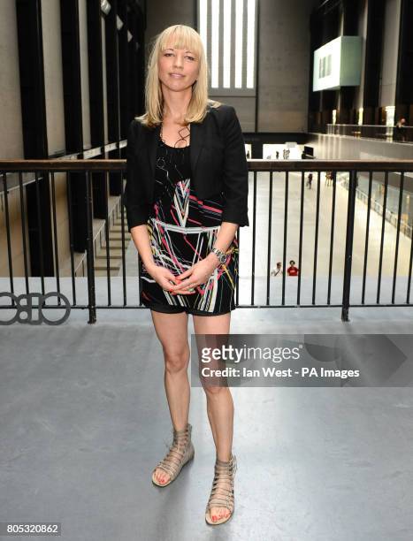 Sara Cox attends a photocall to launch 10:10, against climate change, at the Tate Modern in London.